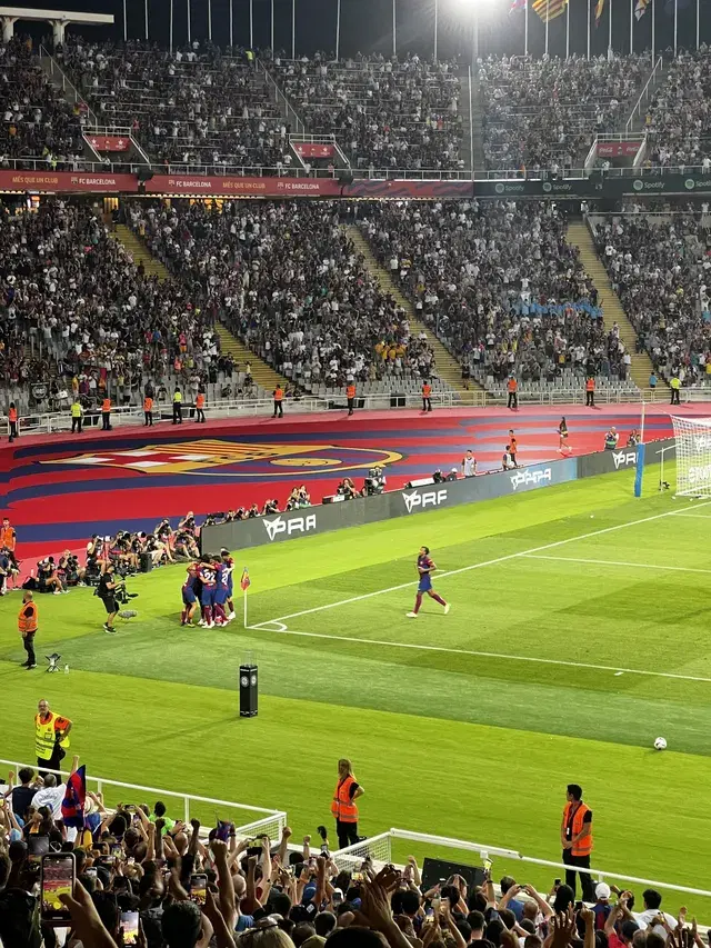 FC Barcelona players celebrating a goal at Estadi Olímpic Lluís Companys in Montjuïc