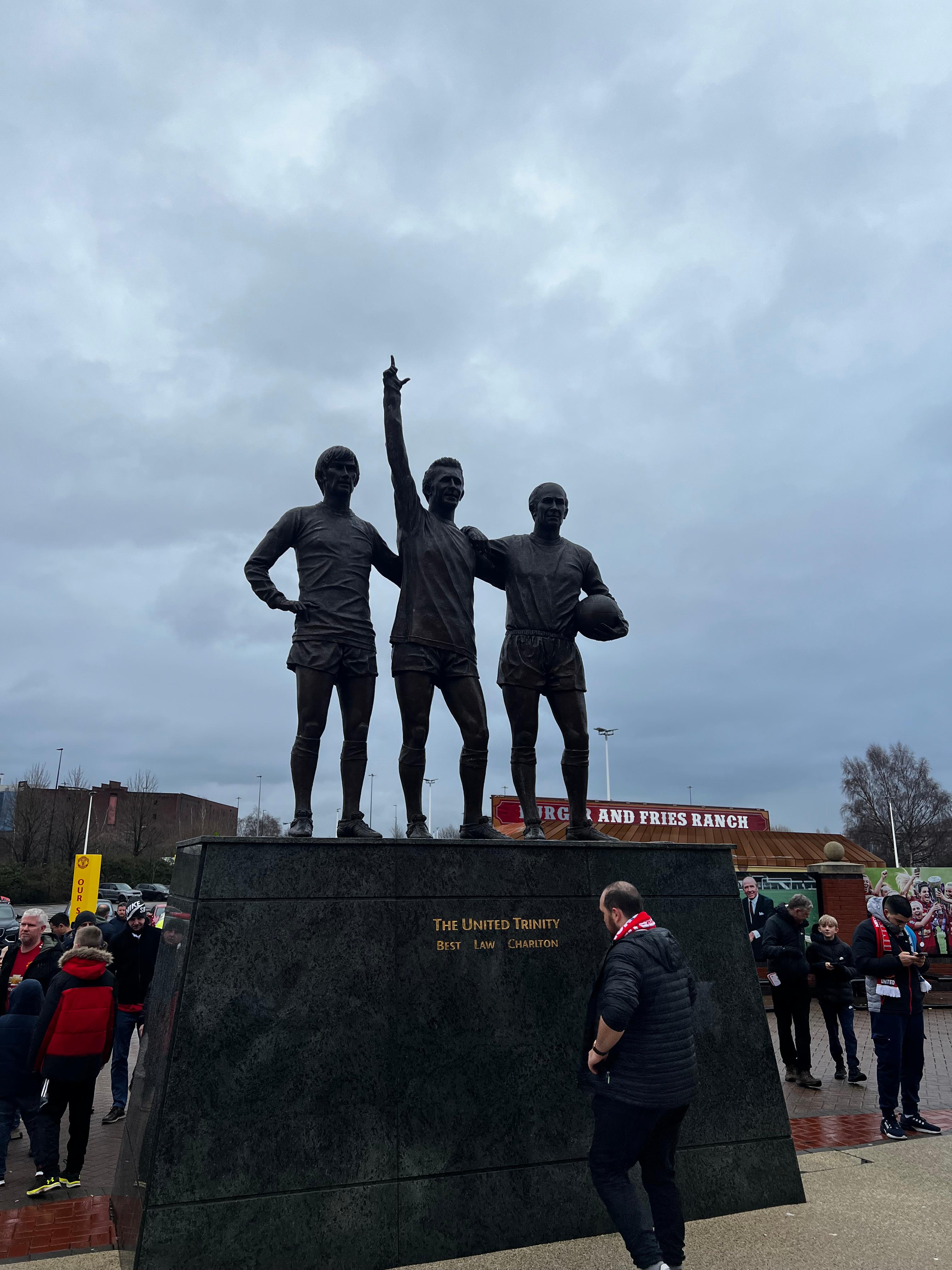 United Trinity statue Old Trafford George Best Denis Law Bobby Charlton Manchester United legends bronze sculpture